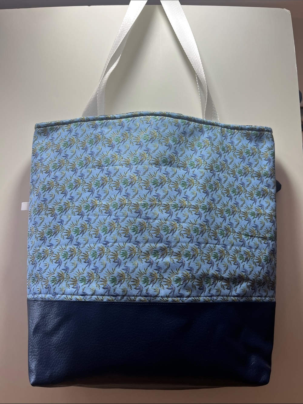 Quilted Light Blue Floral Tote with Navy Base